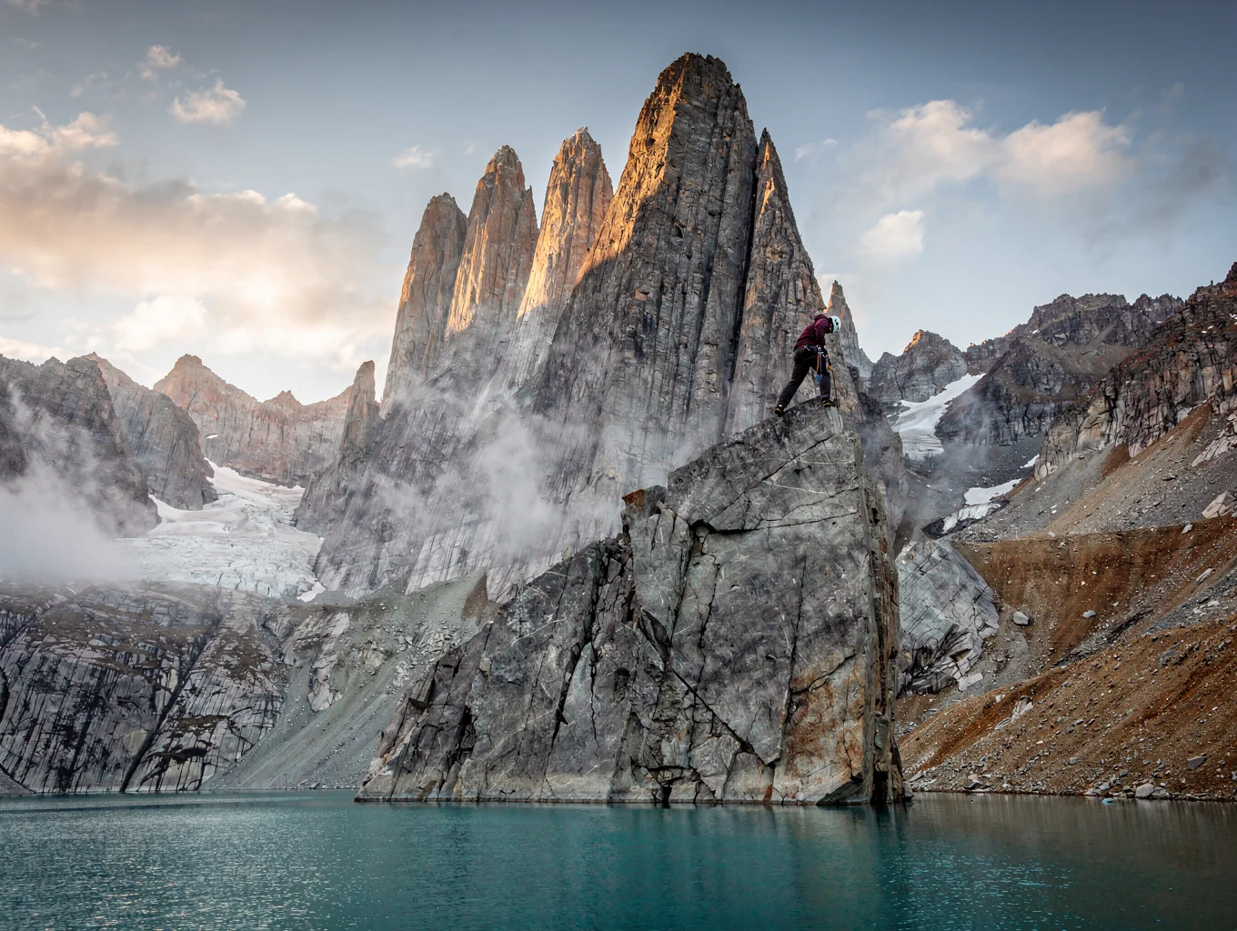 Jagged Patagonian granite spires engulfed in dramatic storm clouds